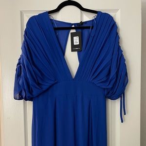BRAND NEW WITH TAGS Fashion nova Blue chiffon Jumpsuit plunge neck V-neck back